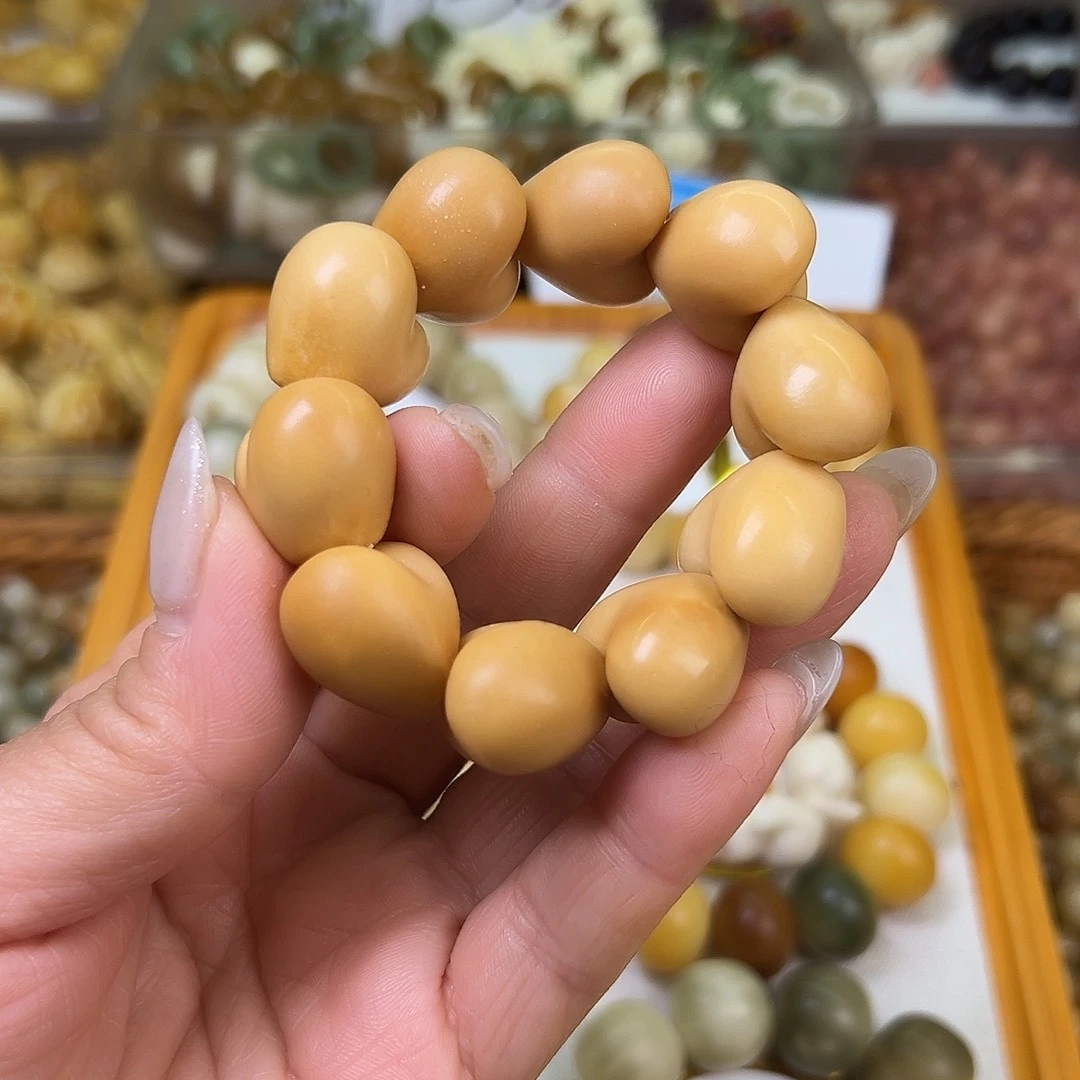 菩提根/象牙果吊坠瑕疵咖爱心10颗孔道有裂