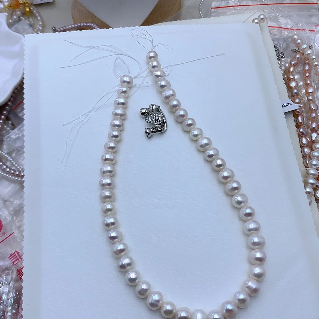 淡水珍珠合金胸饰