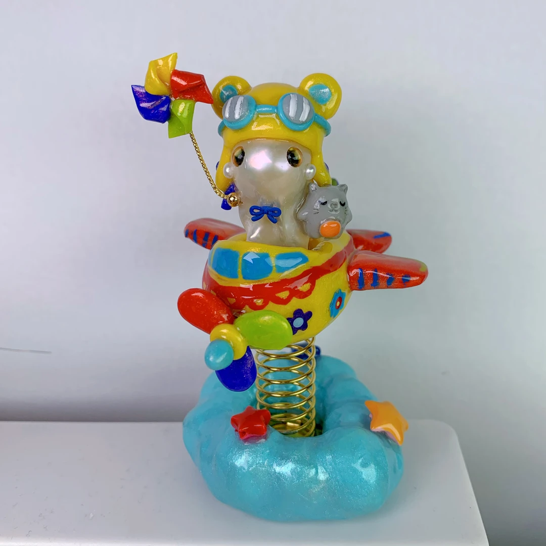 黄色舒克小飞机弹簧手工巴洛克小怪兽小精灵摆件
