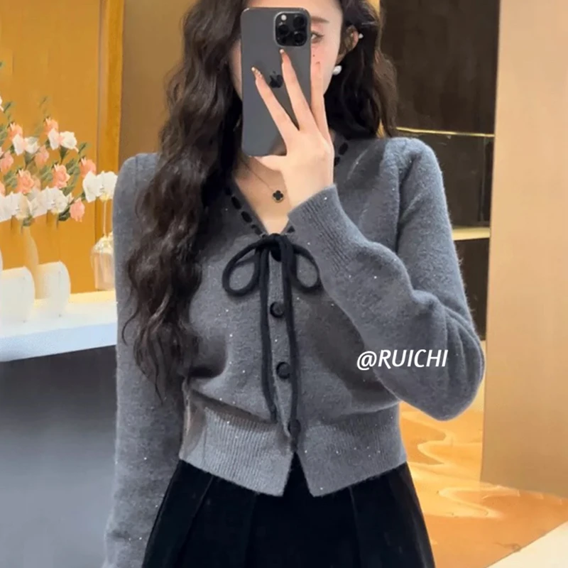 小香风温柔蝴蝶结2025秋冬新款甜美小众设计感毛衣外套针织开衫女