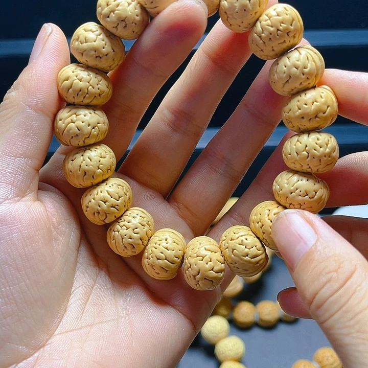 汪***艺吊坠桃核桃核手串