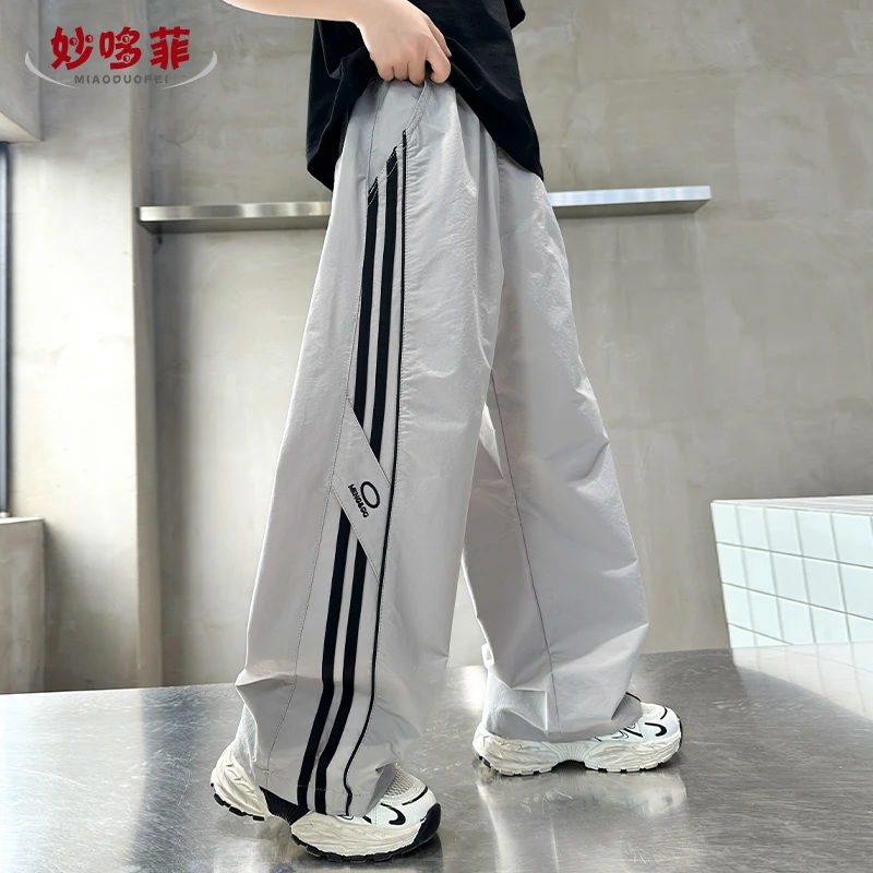 儿童裤子夏季薄款2025新款男童帅气休闲裤夏装男大童宽松速干长裤