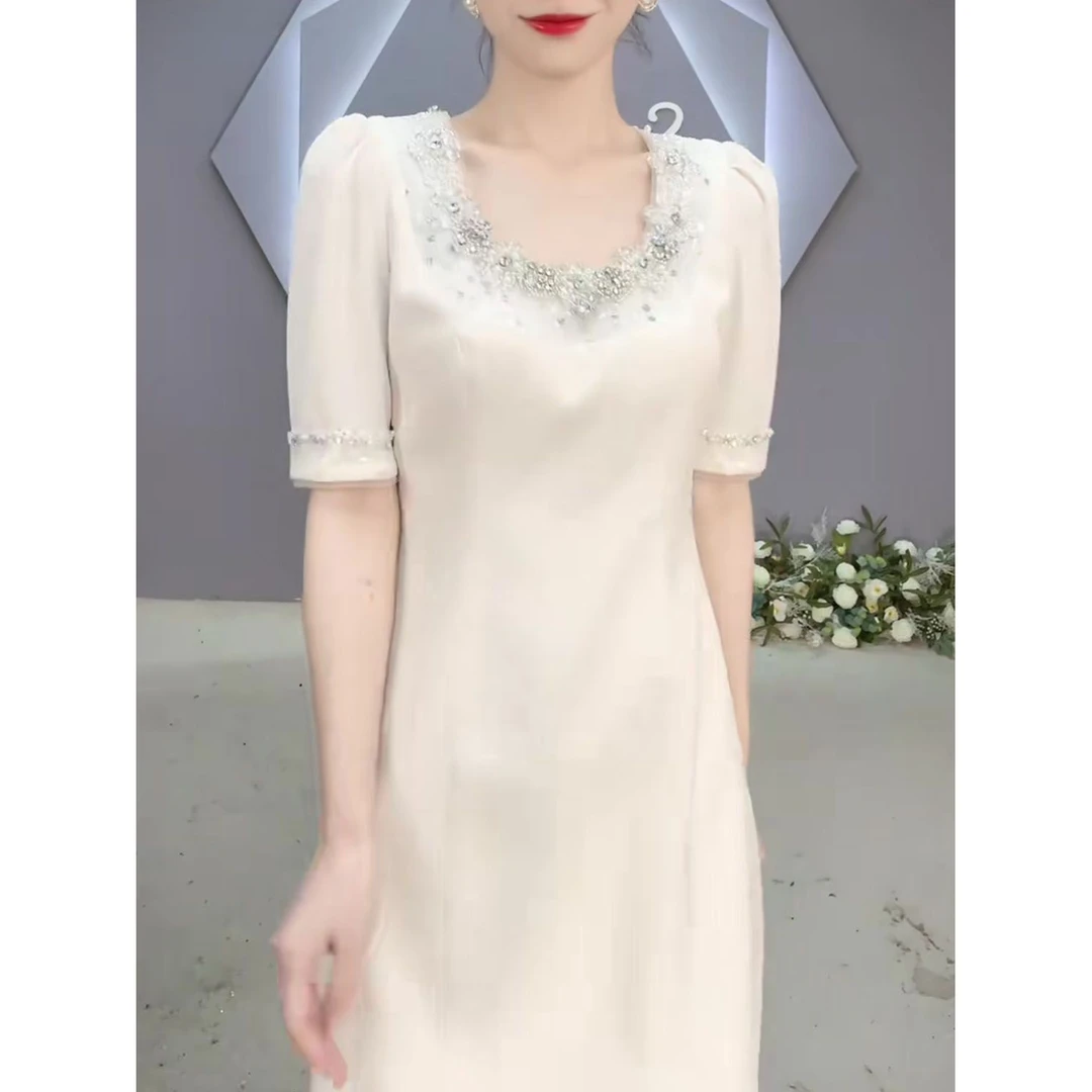 高级感遮肚子白色连衣裙女2025夏季新款时尚修身气质显瘦a字裙子