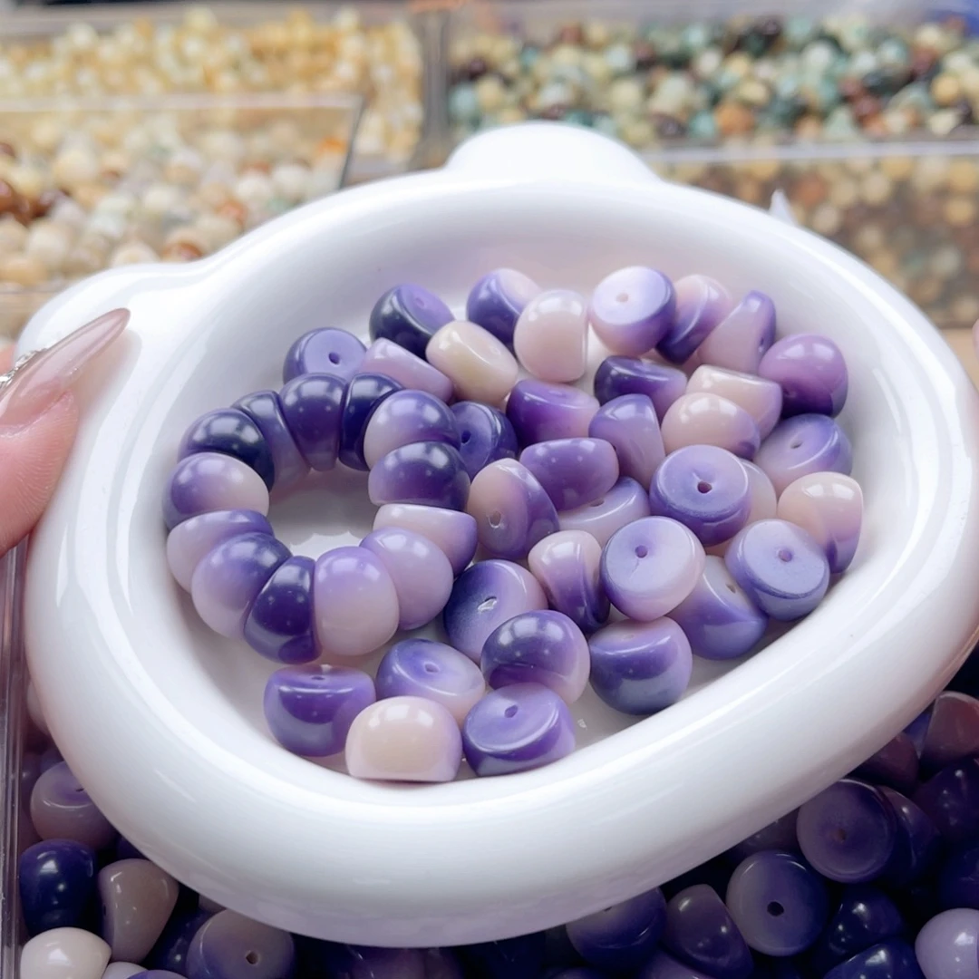 白玉菩提吊坠c14.75mm40+10颗。紫玉蝶蒜瓣