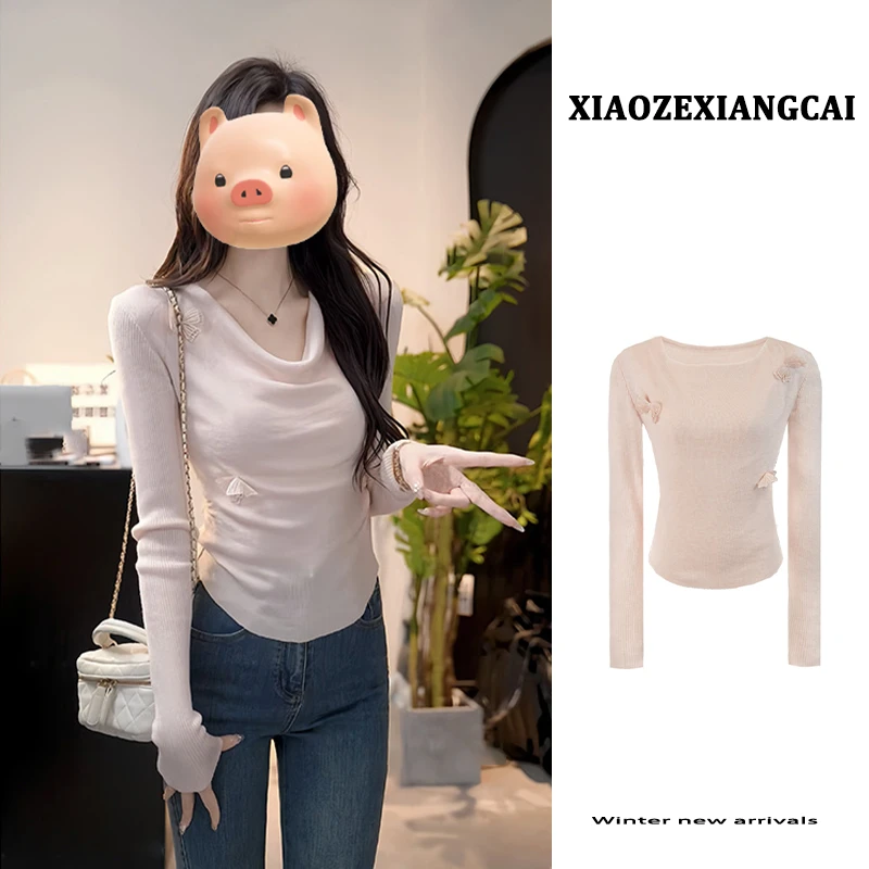 开春穿搭法式荡领粉色长袖针织衫女2025早春新款修身显瘦露肩上衣