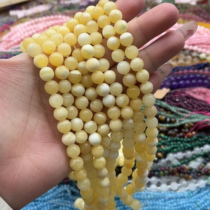 玛瑙/玉髓未镶嵌珠宝半成品2条8mm左右黄金玉几颗有瑕