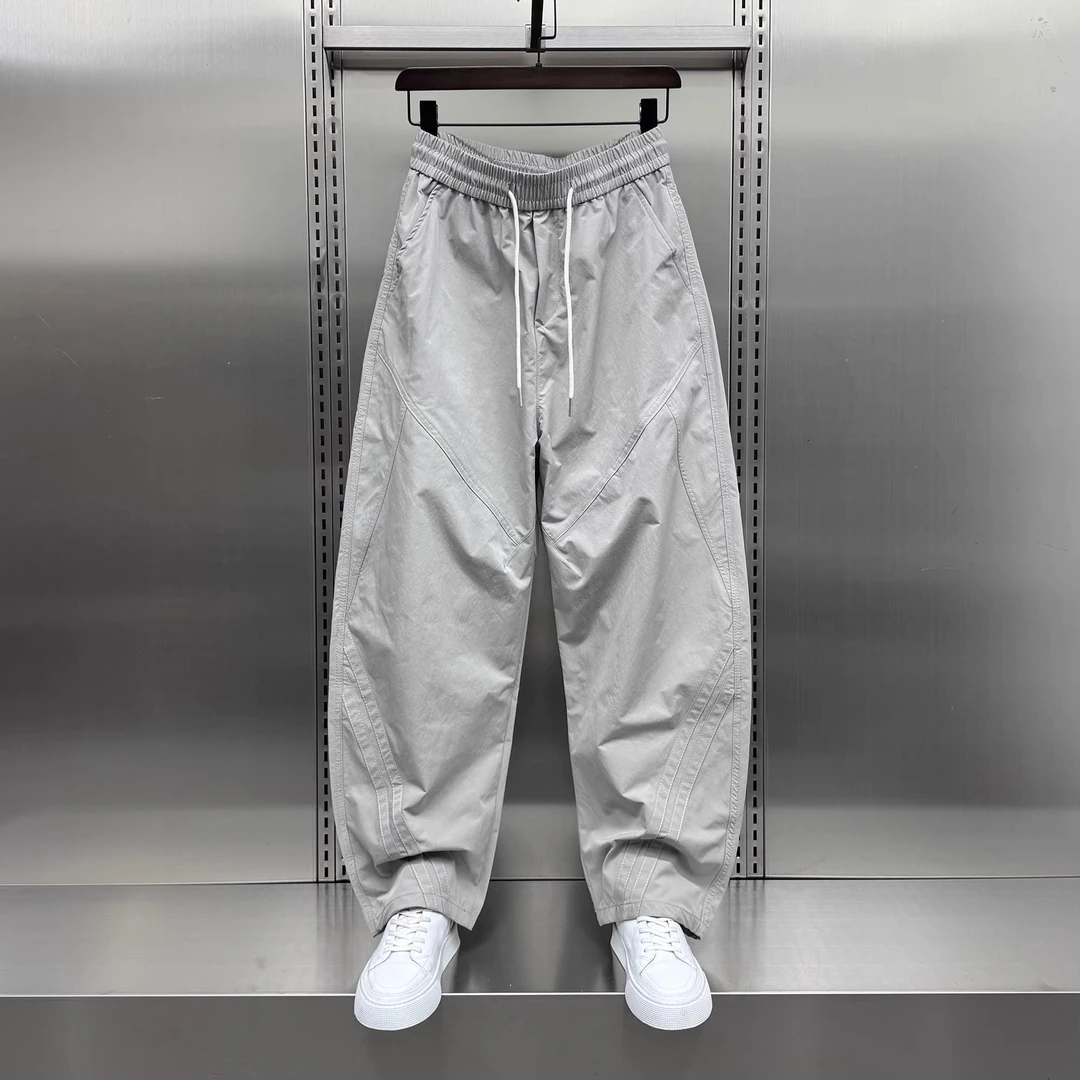 高街设计感痞帅拼接速干工装裤男士2025夏季薄款百搭潮流小弯刀裤