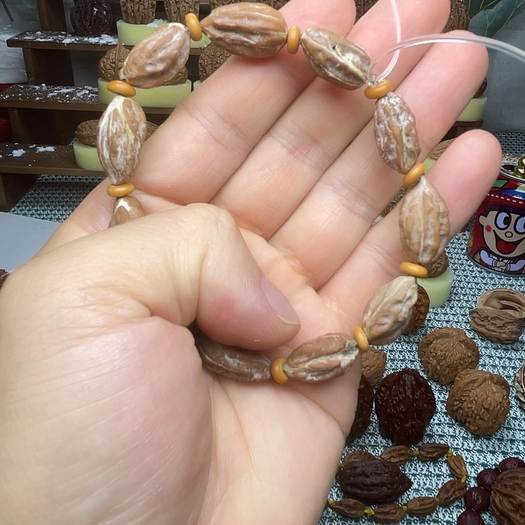 用***6猴头核桃把件葡萄干异形单圈12颗