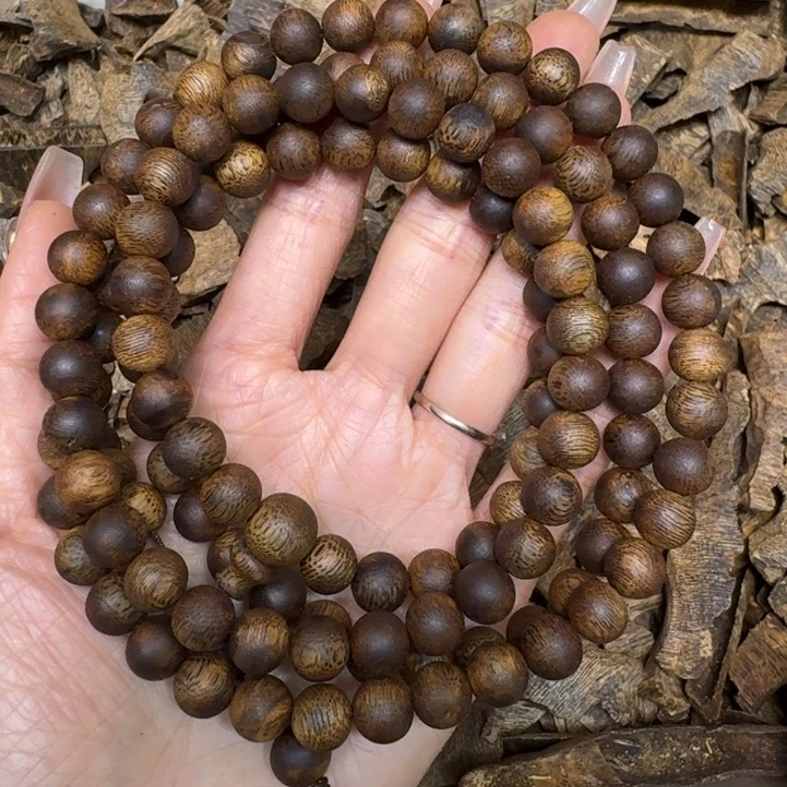 沉香手串张勺子沉浮一条