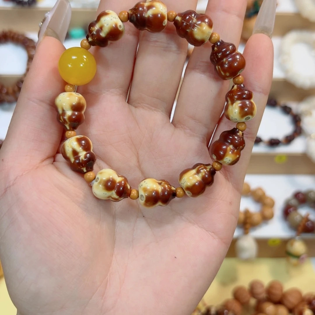 手串星月菩提花皮紫金鼠➕黄珠