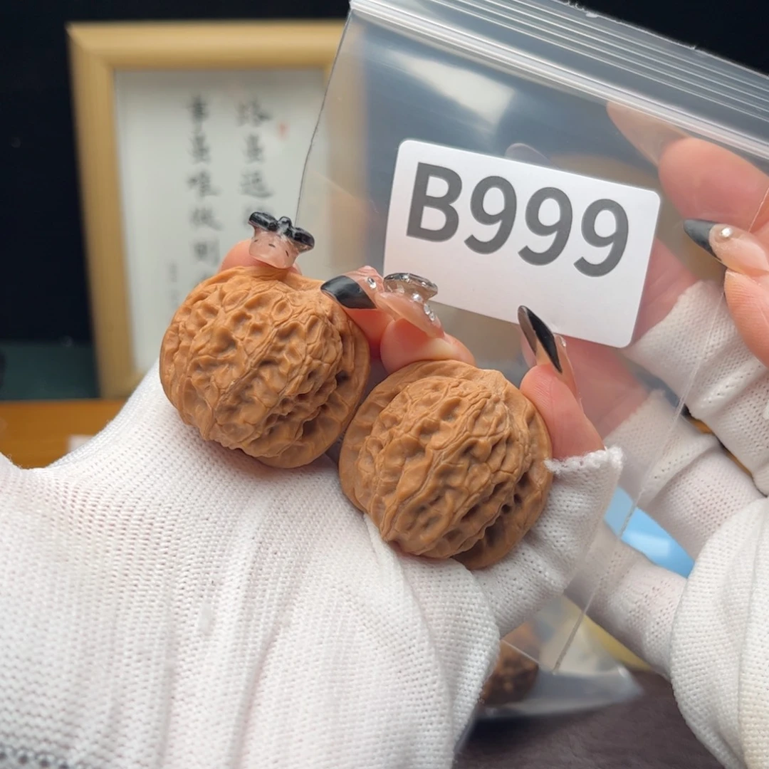 衡***哥文玩核桃把件35龙胆元宝b999