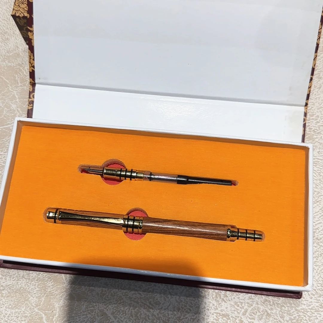 花梨木类家具越黄签字笔