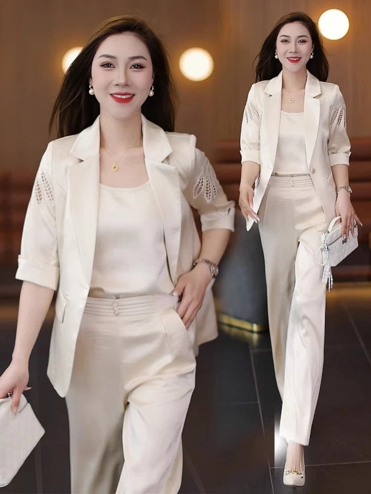 时尚西装套装女夏季新款洋气镂空中袖西服吊带休闲西裤职业三件套