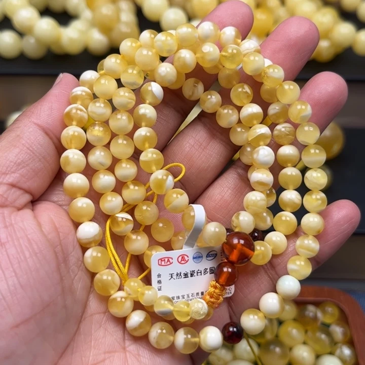 琥珀未镶嵌珠宝奇石M1060号6.8+金瓷白妖花