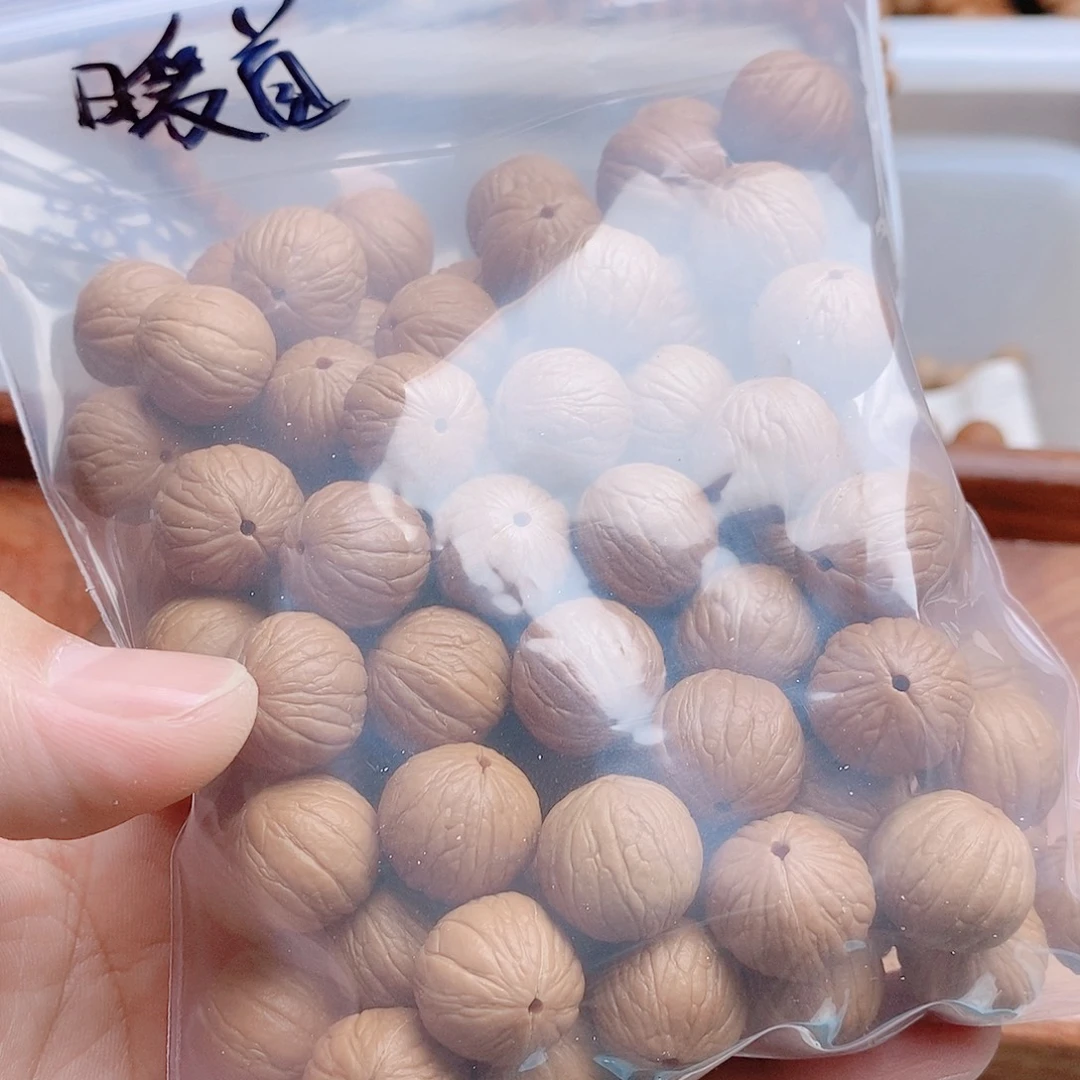 暖****聚宝盆散籽打孔包邮100颗