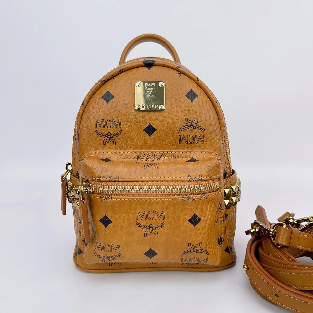 95新 MCM MCM迷你干邑色双肩包底长17 N899