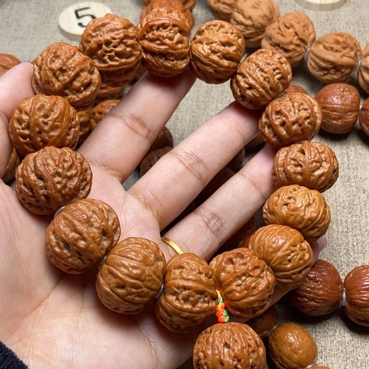 文玩核桃吊坠珊瑚磨盘