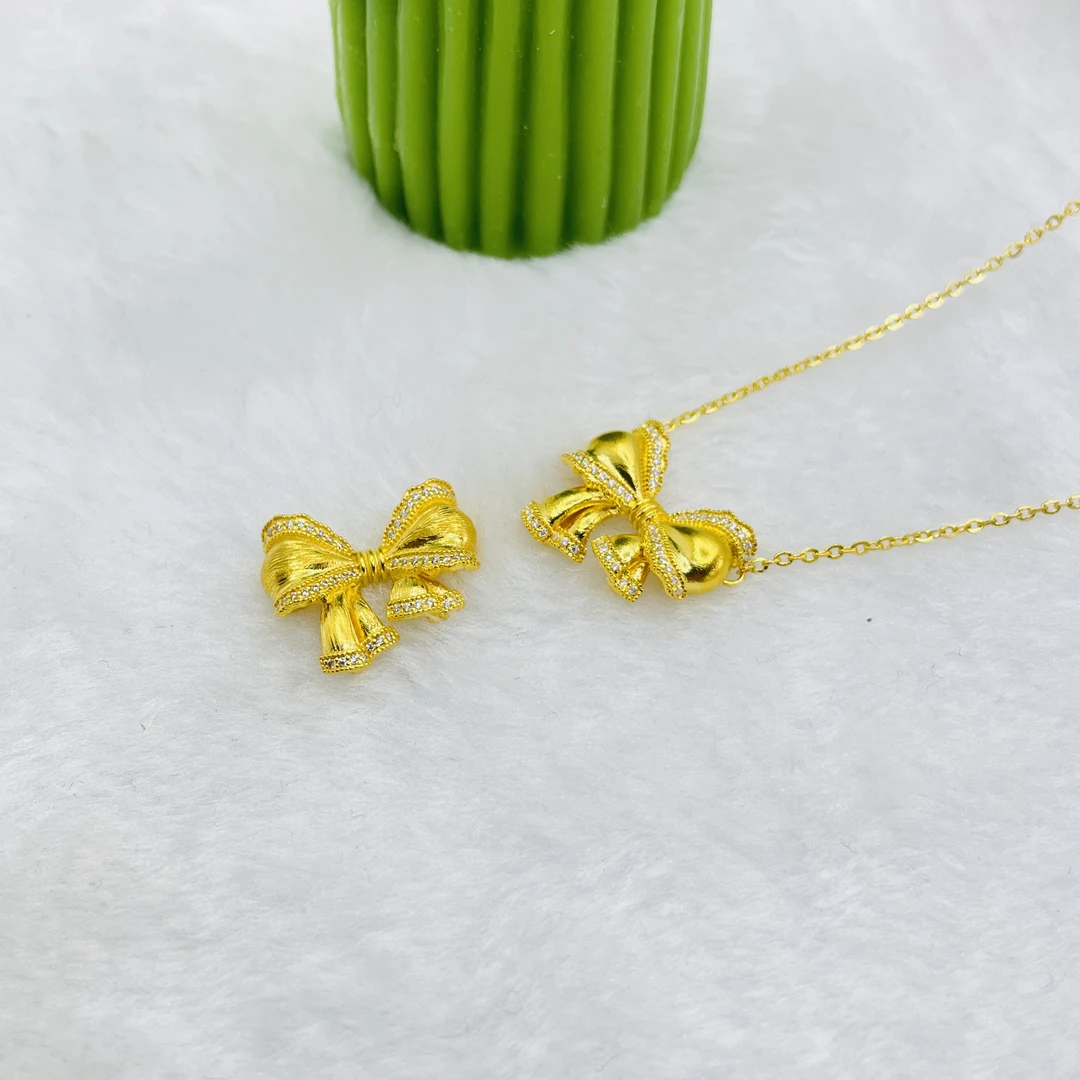 足金999镶嵌蝴蝶结吊坠.镶嵌蝴蝶结套链附加费268