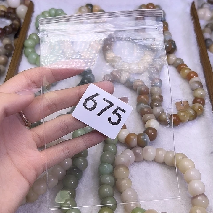 爱***妞吊坠菩提根/象牙果675