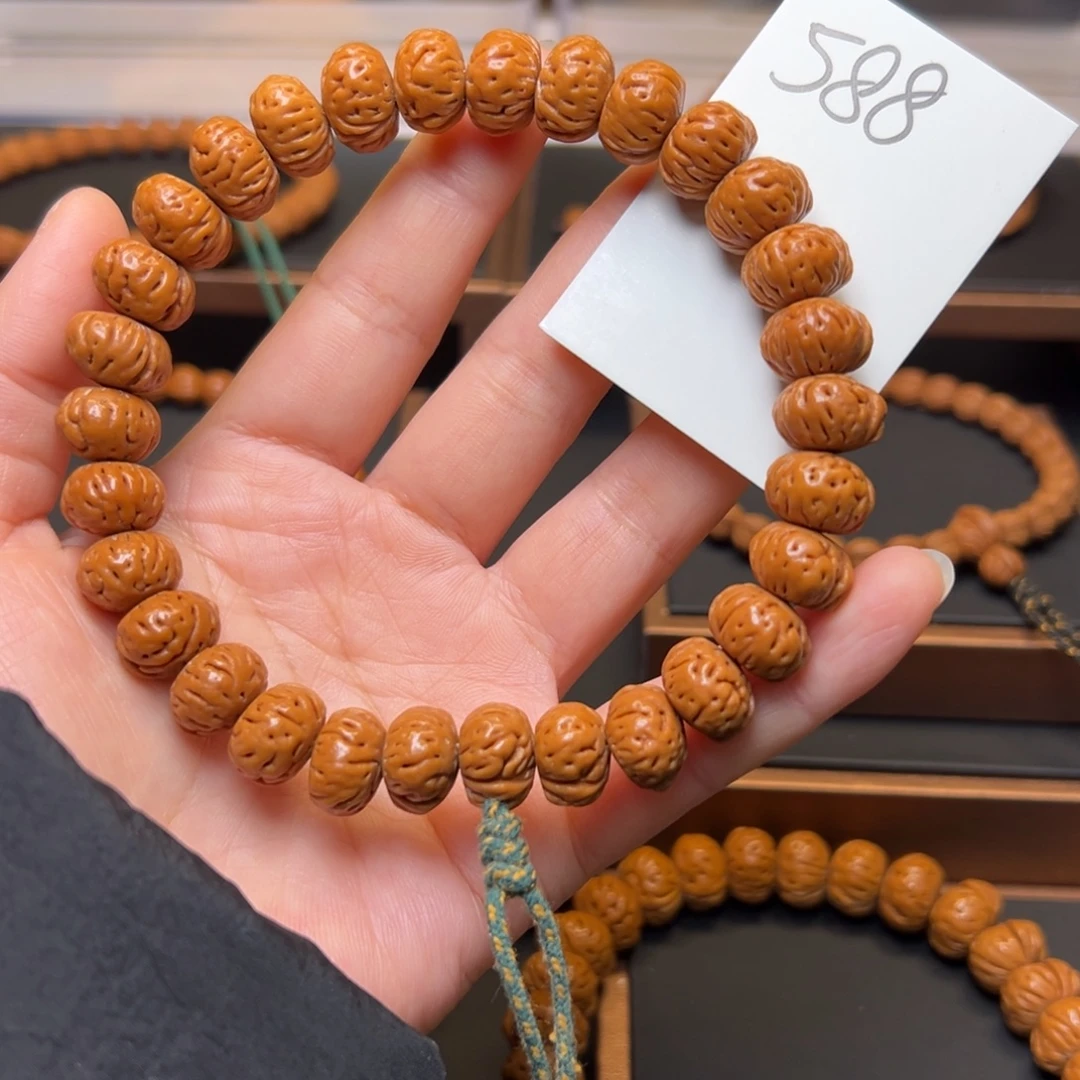 文玩核桃把件秦岭龙纹桃核14蟠桃手持