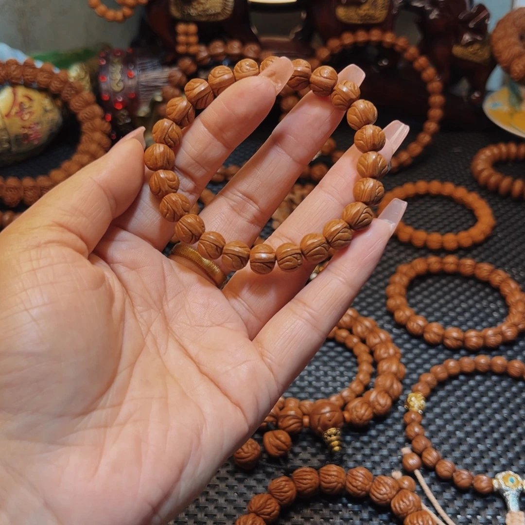 甜****桃核手串10精品玉龙脊单圈