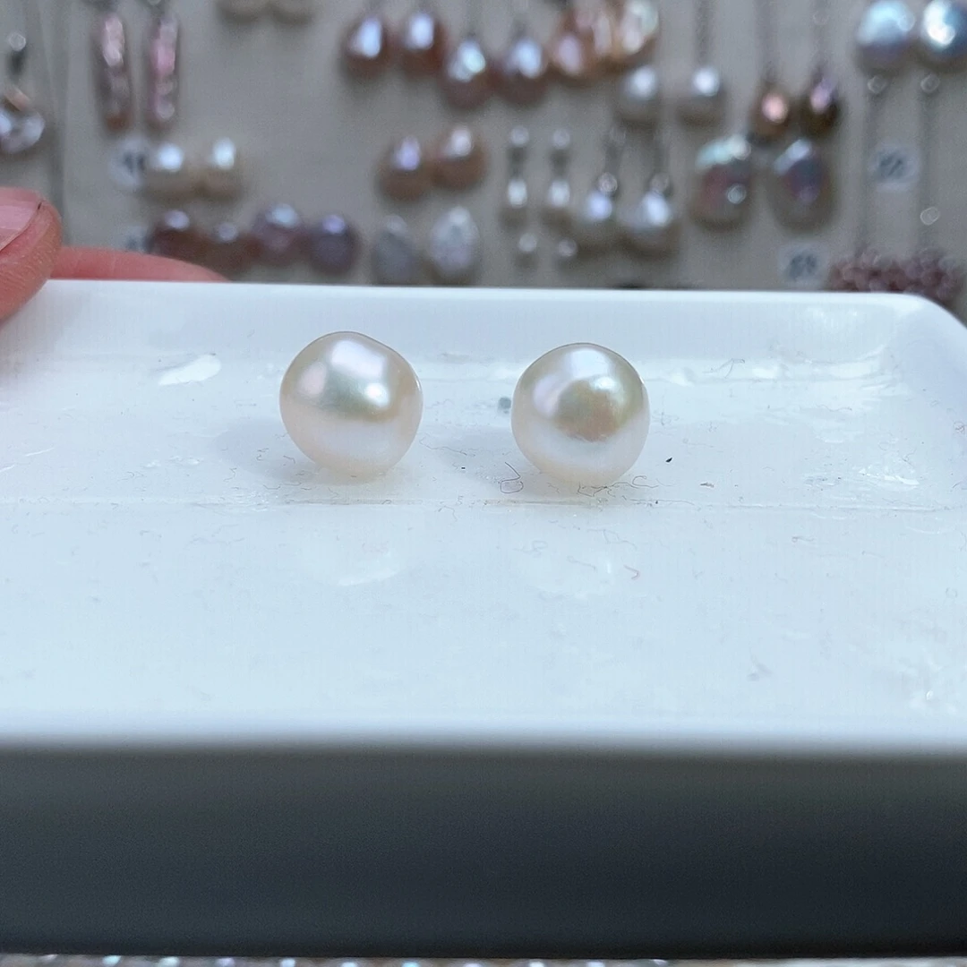 淡水珍珠耳饰银S925镶嵌3****?