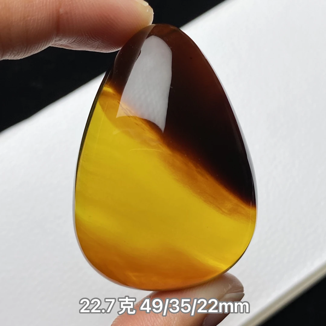 【小伊琥珀】22.7克金底红蜜溶洞水滴
