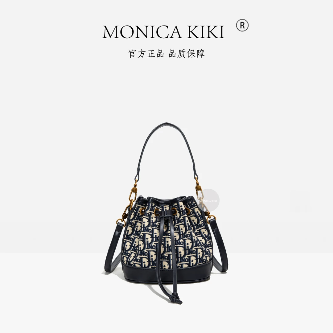 MONICA KIKI/莫妮卡奇奇提花深蓝钱袋子抽绳时尚女士