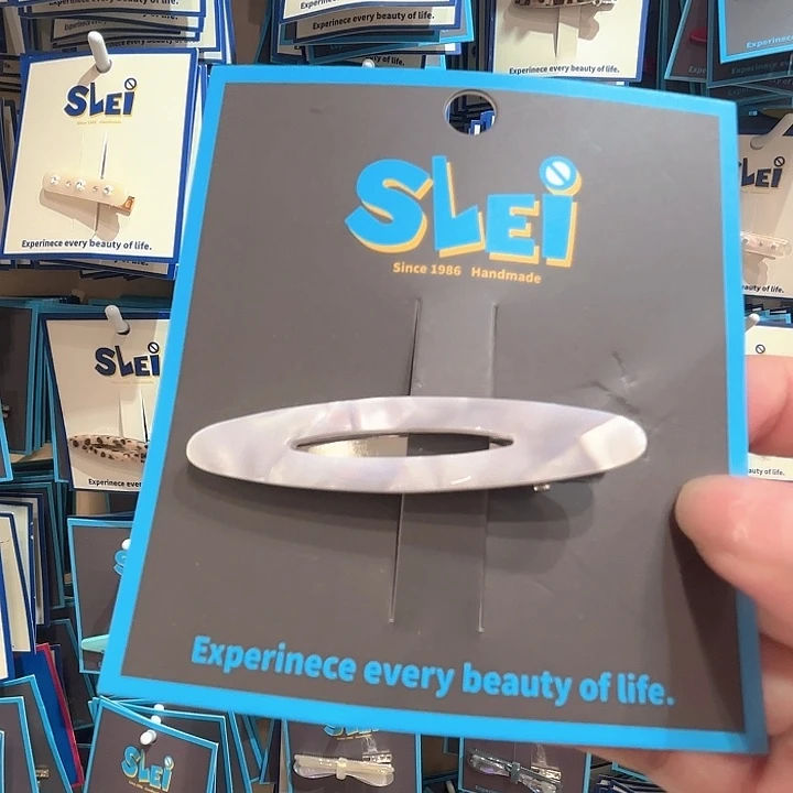 皮质铁合金白色镂空发夹