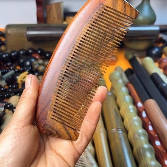 木爱***道微凹黄檀木梳一个豆豆