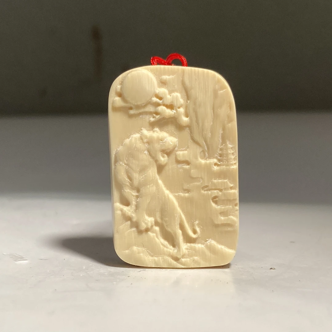 猛犸牙雕上山虎吊坠牌36*23*8mm假一罚四X3586