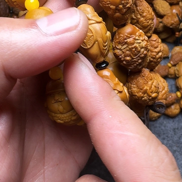 橄榄核手串你是谁