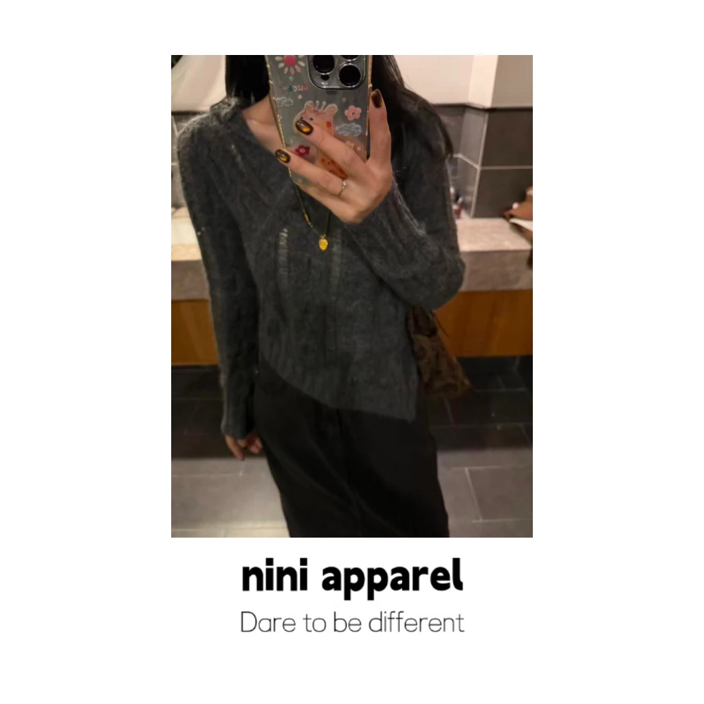 NiNi:设计感别致心机羊 毛帽衫～