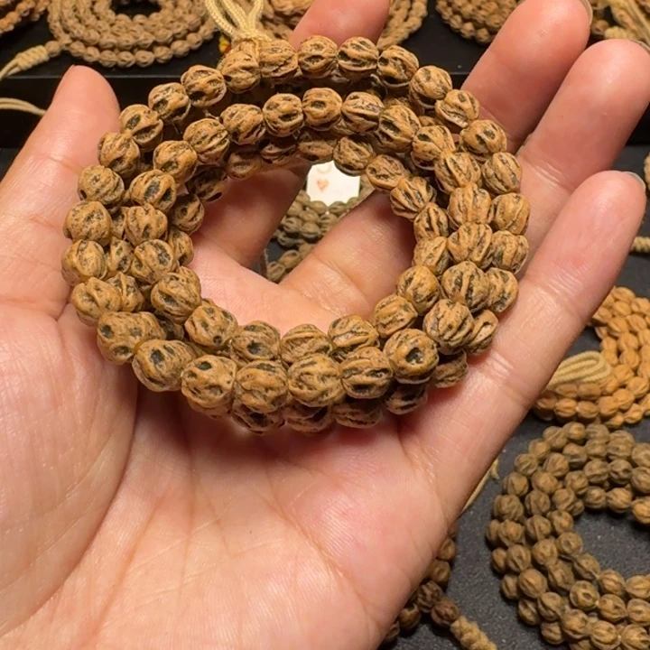 诸***顺吊坠柏香籽/百香籽红油皮莲花乱鬼