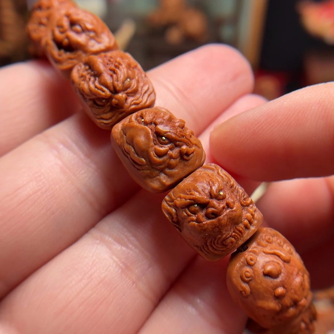 询价桃核雕刻瑞兽手串