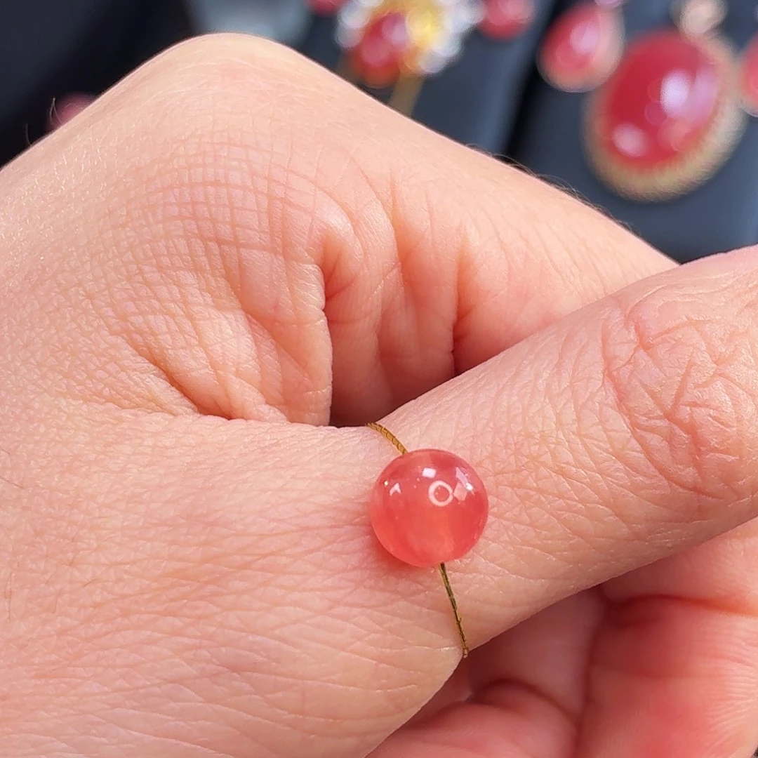 菱锰矿（红纹石）未镶嵌珠宝半成品0.704g7.2mm