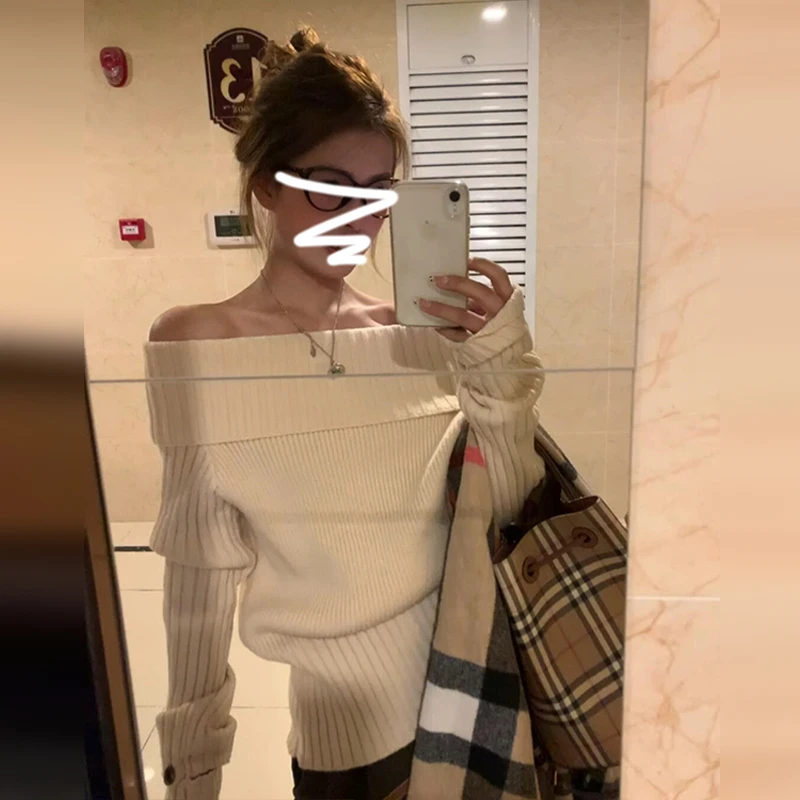 今年流行独特漂亮超好看慵懒高级感显瘦一字肩露肩毛衣上衣女秋装