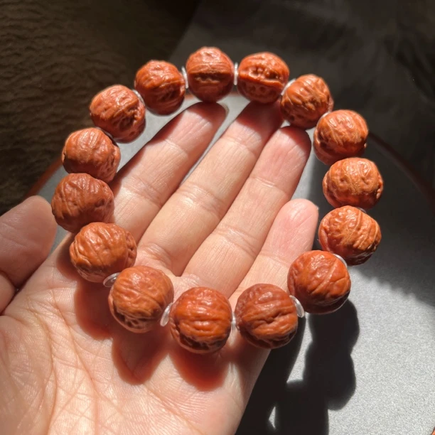 野生小核桃【富甲天下】粉红皮元宝肚平底文玩核桃手串