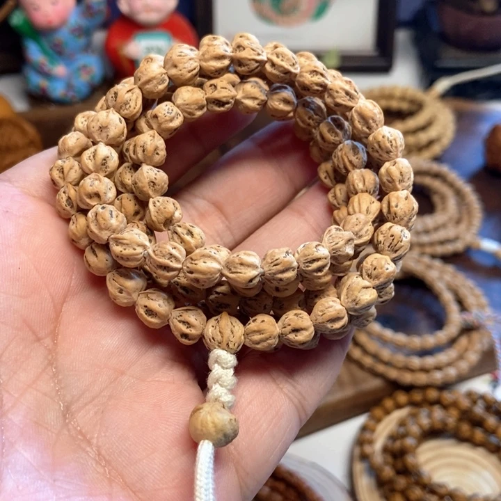 昶***贸柏香籽/百香籽吊坠