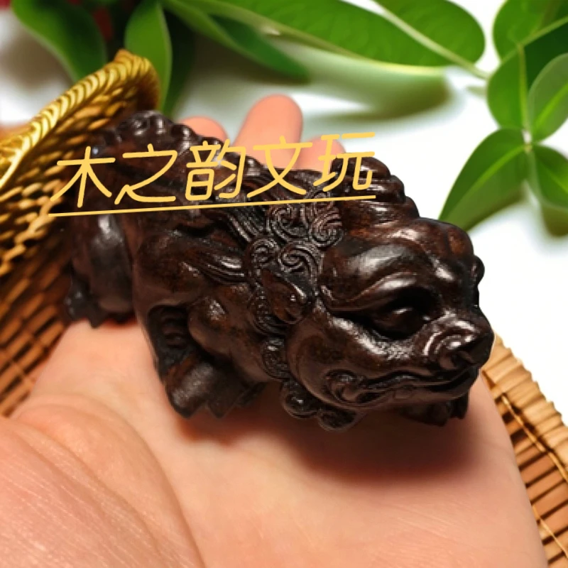 印尼香木木雕手把件独角霸王貔貅