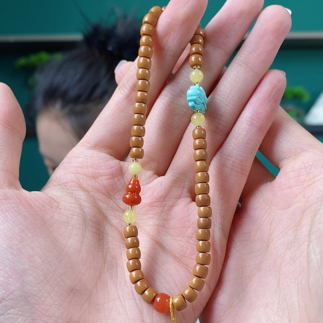 橄榄核吊坠V****儿多样性