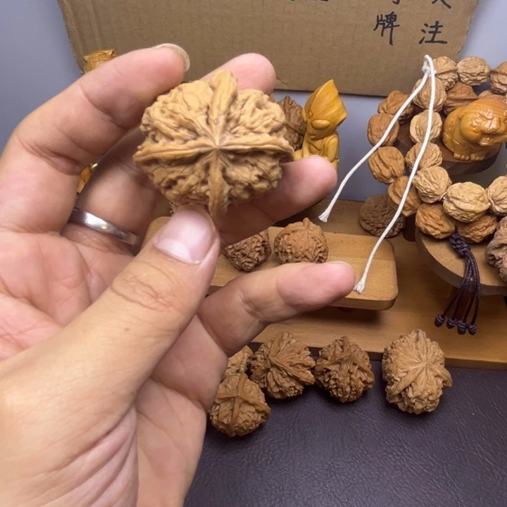 用***5吊坠桃核雨花石四棱瑕疵