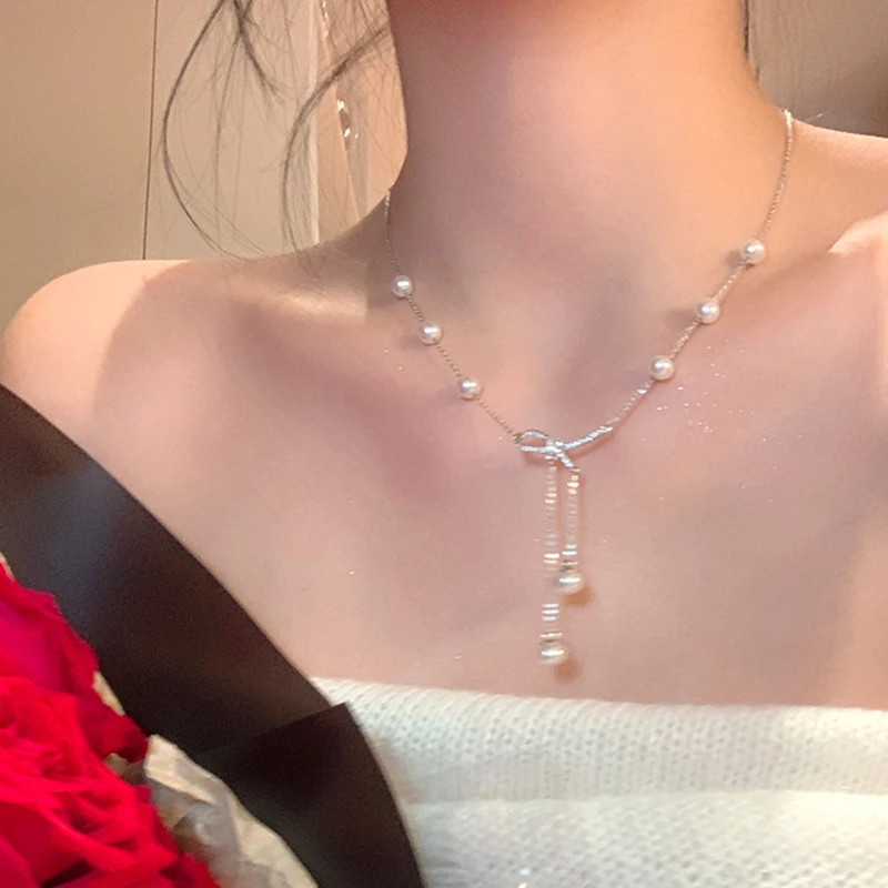 合金项链 蝴蝶结珍珠流苏项链女轻奢高级感颈链小众设计锁骨链