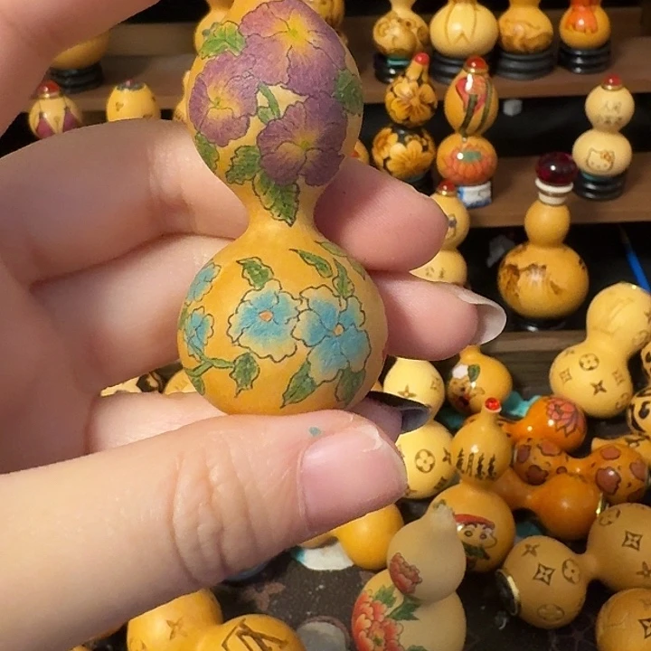 金***子陶瓷葫芦绕指手把件