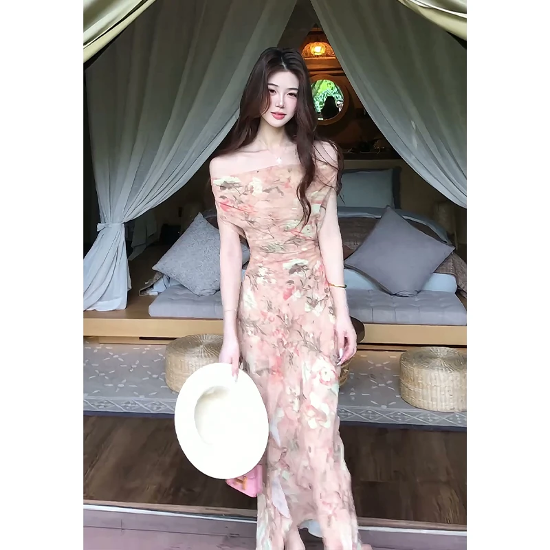 设计感连衣裙2025夏季新款女一字肩收腰荷叶边碎花中长款包臀裙子