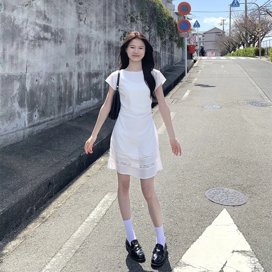 白色法式桔梗镂空连衣裙女2025夏季新款设计感独特别致绝美短裙子