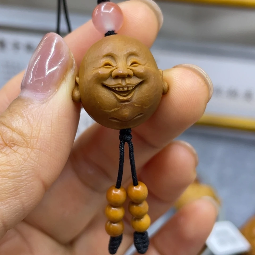 橄榄核吊坠笑佛单子