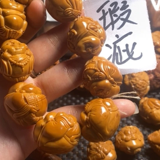 橄榄核吊坠吕*生微上色