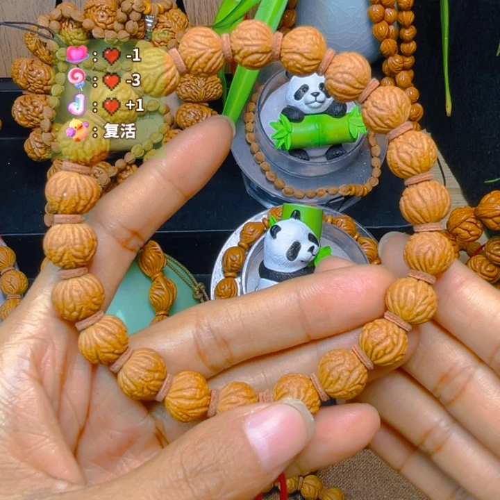 忍***.吊坠桃核绣绣绣绣757575