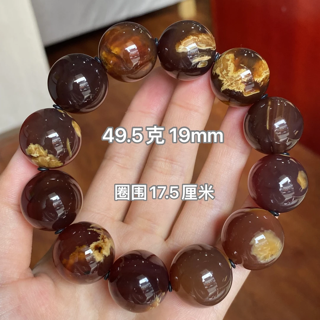 【小伊琥珀】49.5克花根溶洞手串